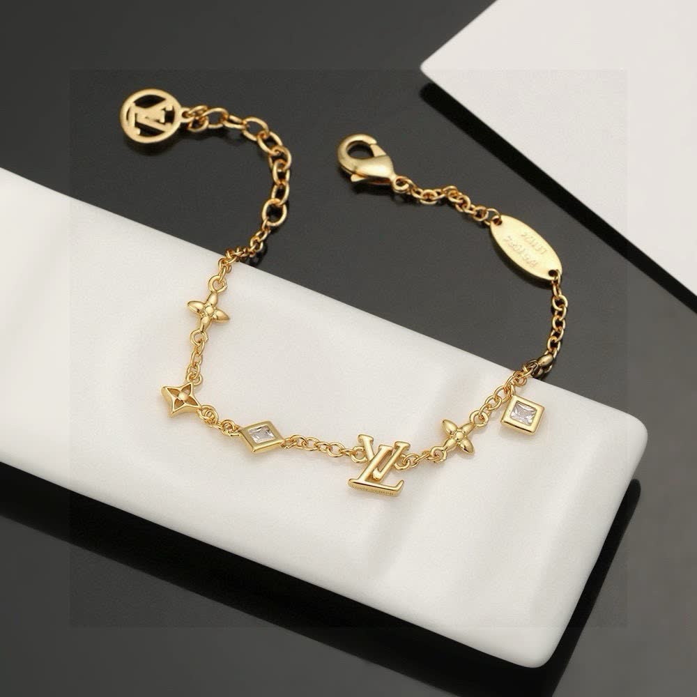 Louis Vuitton Gold Tone Charm Bracelet